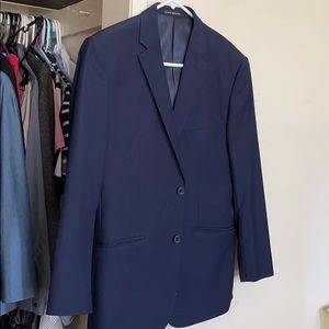 Very fitted navy blue suit jacket